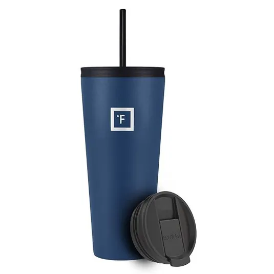 A navy blue 32oz tumbler with a black lid and straw, featuring a square logo with \“°F\“ on the side. An additional black, slide-top lid is shown in front.