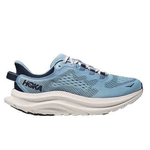 Light blue athletic shoe with a breathable mesh upper, cushioned sole, and distinctive wave-like midsole design. It features a pull tab at the heel and branding on the side.