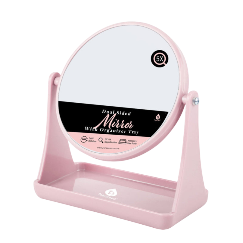 A dual-sided pink mirror with a 5X magnification on one side, featuring 360° rotation and an organizer tray stand.