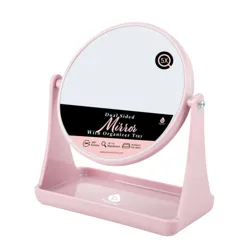 A dual-sided pink mirror with a 5X magnification on one side, featuring 360° rotation and an organizer tray stand.