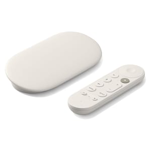A sleek, oval-shaped 4K streaming device paired with a compact remote control featuring navigation and home buttons, volume control, and quick access to popular streaming services.