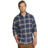 A man wears a blue plaid button-up shirt paired with brown pants.