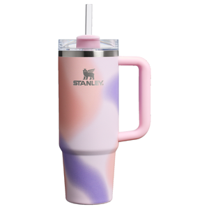 Stanley tumbler with handle and straw, featuring a pastel swirl design in pink, purple, and white.