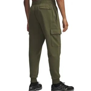 Olive green cargo joggers with elastic cuffs and a side pocket, paired with black sneakers featuring a white logo and design accents.