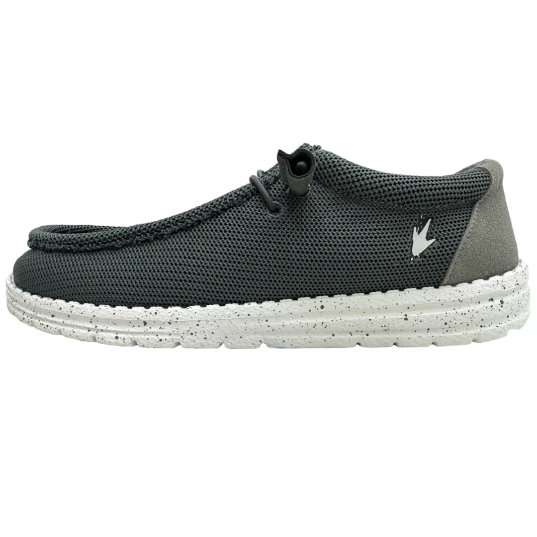 A casual, slip-on shoe with a dark mesh upper, a cushioned speckled white sole, and a small bird emblem on the side, designed for comfort and ease.