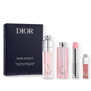 Dior Addict 3pc set includes a lip gloss, balm, and plumping gloss, all in shades of pink. Packaged in sleek tubes with silver accents, ideal for a natural glow effect.