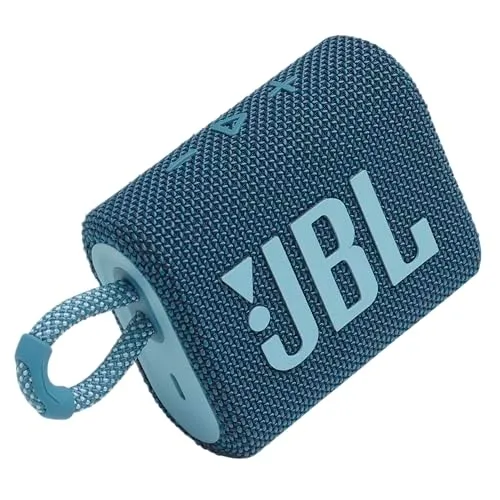 A compact, blue JBL portable Bluetooth speaker with a fabric covering and integrated carry loop.