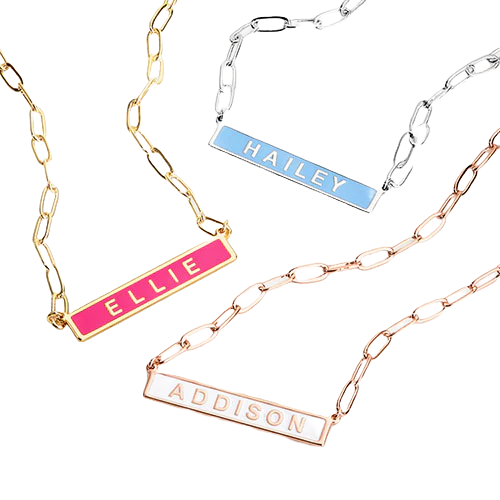 Three necklaces with chain links and rectangular name plates in different colors: pink with \“ELLIE,\“ blue with \“HAILEY,\“ and rose gold with \“ADDISON.\“