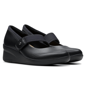 Clarks Leather Mary Jane Wedge Shoes feature a smooth black leather upper with an elastic strap across the top, complemented by a sturdy wedge heel for added height and comfort.