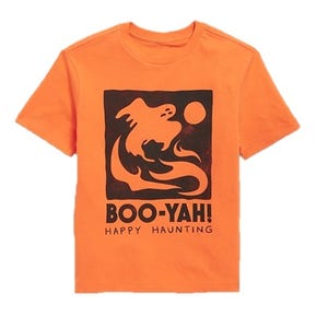 An orange T-shirt featuring a playful ghost design and the text \“BOO-YAH! HAPPY HAUNTING\“ in black.