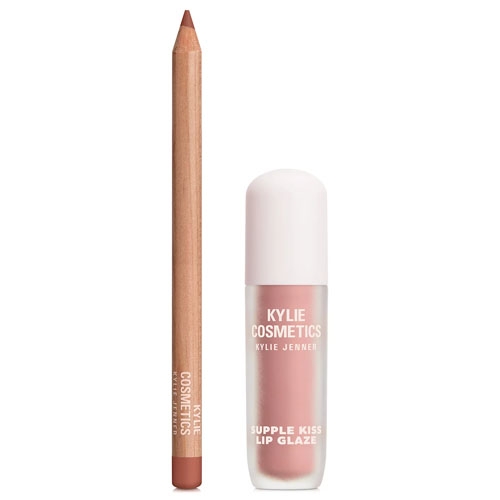 Kylie Cosmetics Lip Kit includes a lip liner and a Supple Kiss Lip Glaze in a pinkish nude shade, featuring simple, sleek packaging with white accents and brand labeling on both items.