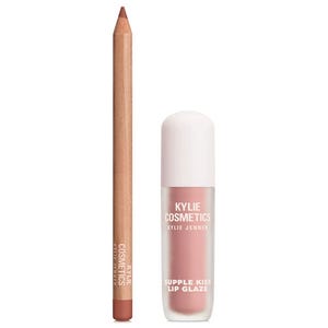 Kylie Cosmetics Lip Kit includes a lip liner and a Supple Kiss Lip Glaze in a pinkish nude shade, featuring simple, sleek packaging with white accents and brand labeling on both items.
