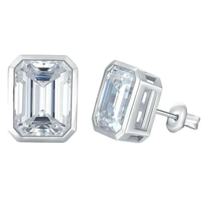 Emerald-cut earrings feature a rectangular gemstone with clipped corners, set in a silver-tone bezel. They have a classic stud design with a post and butterfly backing.