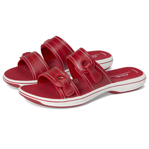 Red Clarks Breeze Maye sandals featuring double adjustable straps with a sporty design, white soles, and logo detailing on the footbed.