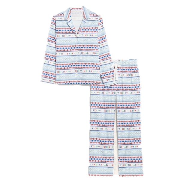 A two-piece pajama set with a top and pants featuring a festive pattern with horizontal stripes of blue, red, and white and text reading \“Merry\“ and \“Joy\“ in a repeating design.
