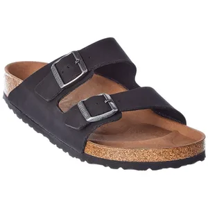 A black two-strap sandal with adjustable buckles and a cork footbed, offering a contoured, cushioned support.