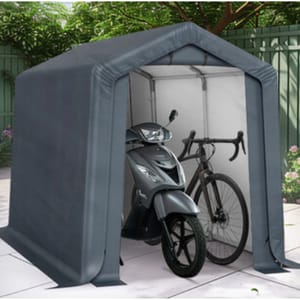 A small portable shelter houses a scooter and a bicycle, offering protection from weather elements.