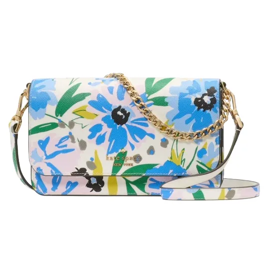A floral-patterned handbag with blue and pink flowers, featuring a chain strap and a smooth leather finish.