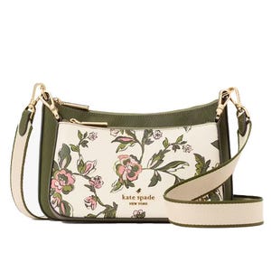 A floral-patterned Kate Spade handbag with green accents, gold-tone hardware, and a green-and-white adjustable strap.