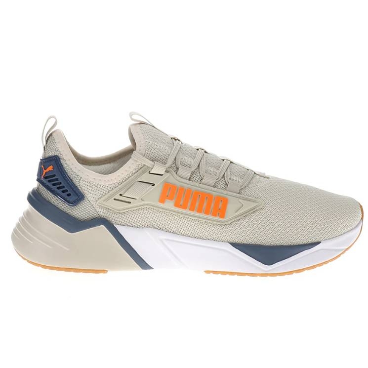 A beige and blue Puma athletic sneaker with orange branding, featuring a mesh upper, lace-up closure, and a cushioned sole.