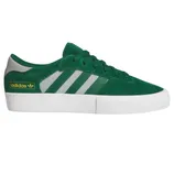 Green Adidas sneakers with white soles, featuring three grey stripes and the Adidas logo in yellow.