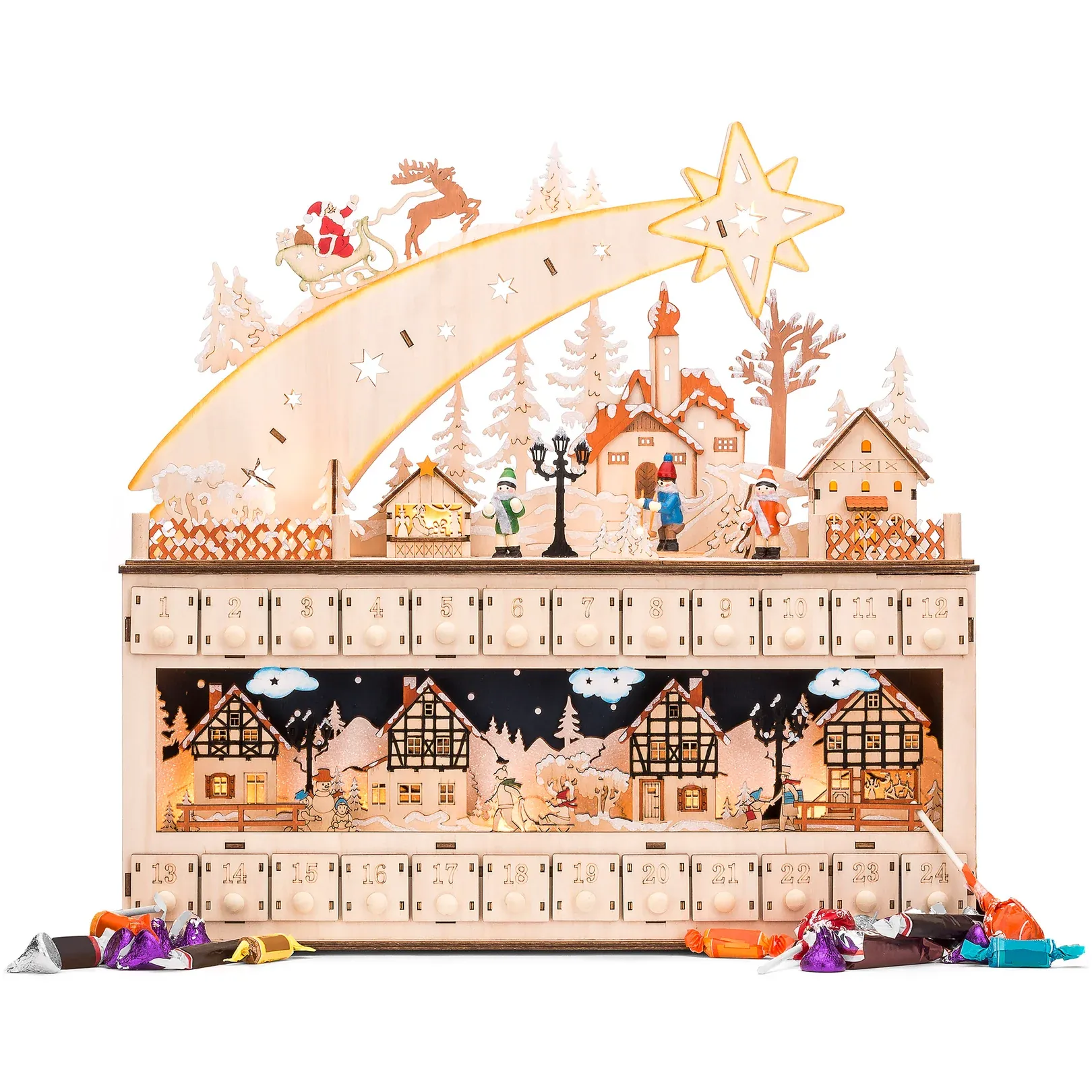 A wooden advent calendar features a festive village scene with Santa in a sleigh, reindeer, and snowy houses. It has numbered compartments for daily surprises during the holiday season, with toys scattered around it.