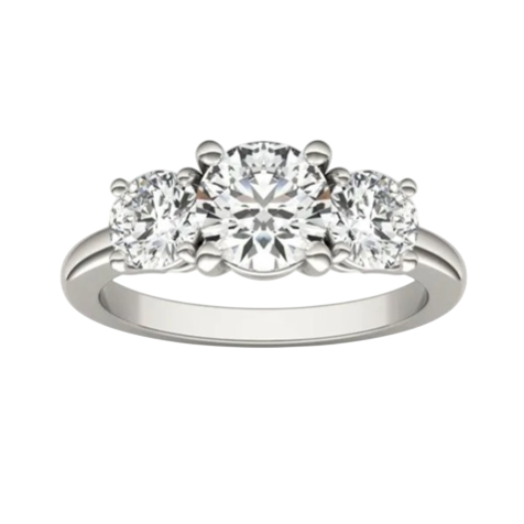 A three-stone engagement ring featuring a central round diamond flanked by two smaller round diamonds, set in a white metal band.