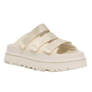Cream-colored platform sandal with three adjustable straps and a rugged sole.