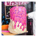 A colorful backpack with a design resembling melting ice cream, complete with pink frosting, sprinkles, and a waffle cone pattern.