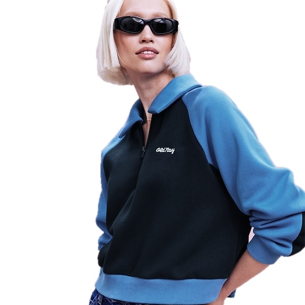 A person wearing a blue and black Old Navy fleece pullover with a half-zip and collared design is posing in sunglasses.