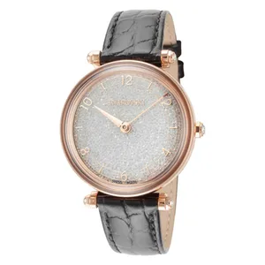 Swarovski watch with a rose gold-tone case, sparkling crystal-studded dial, and black textured leather strap. Swiss-made design.