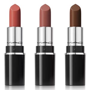 Three MAC lipsticks in varying shades from light to deep brown, with silver and black packaging, are displayed side by side.