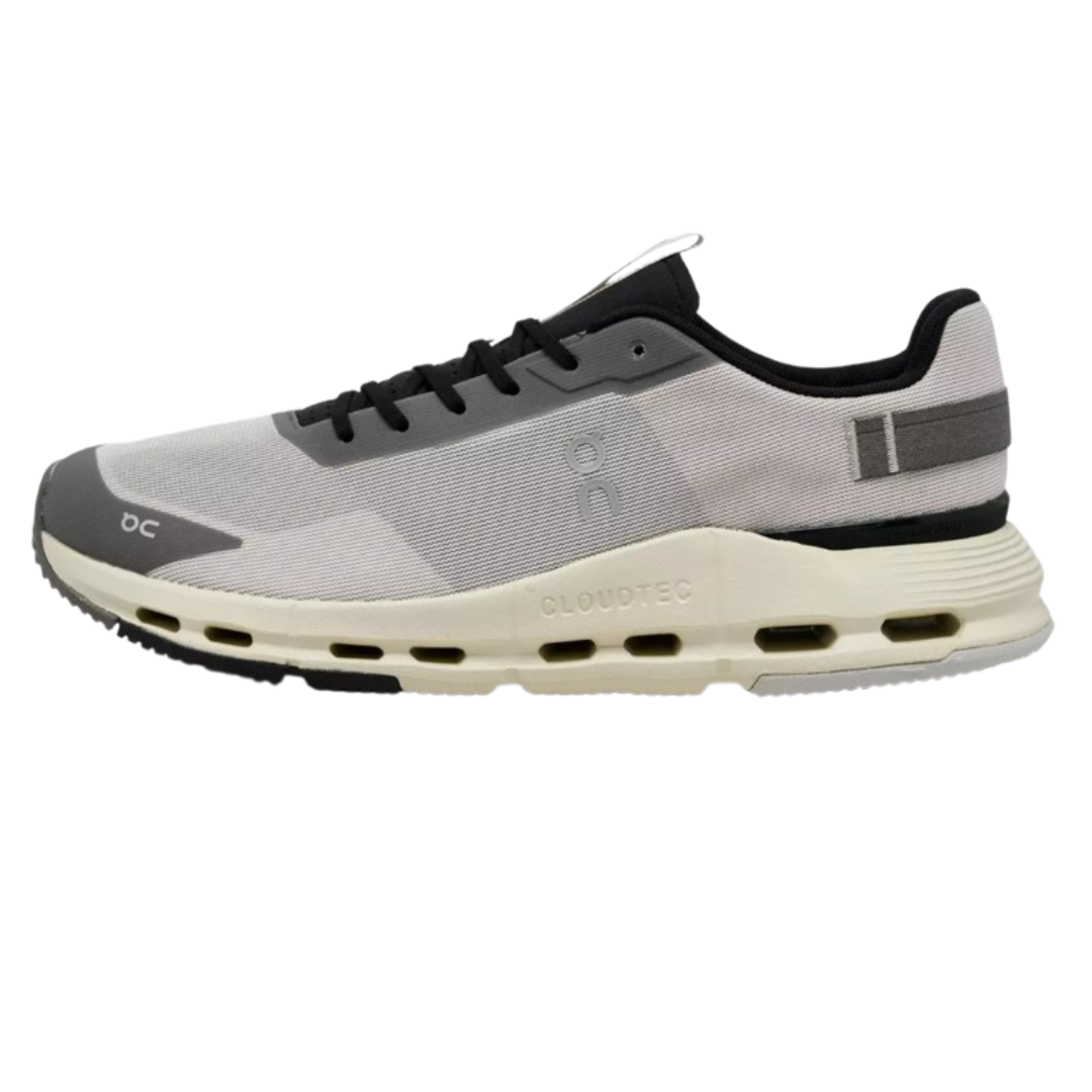 A sporty sneaker featuring a white and gray color scheme, mesh upper, black laces, and \“CLOUDTEC\“ cushioning technology.