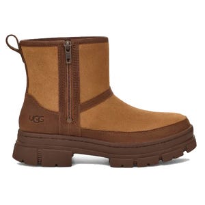 Brown UGG boot with a suede upper, zipper on the side, and a chunky rubber sole.
