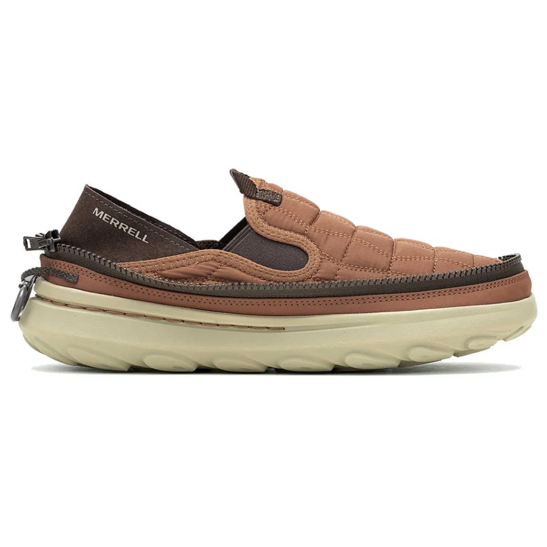 Merrell slip-on shoe with a brown quilted upper, elastic insert, and a thick, textured beige sole. Features a zipper detail wrapping around the midsole.