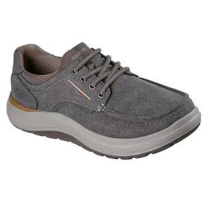 Gray casual sneaker with a lace-up front, cushioned sole, and textile upper material, featuring subtle stitching details and branding.