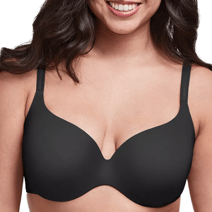 A woman wearing a black, seamless, lightly padded bra with adjustable straps.