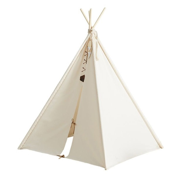 A cream-colored kids' play tent with a classic teepee design, featuring wooden poles and a simple doorway secured by ties. It includes a decorative hanging with feathers and shapes for added charm.