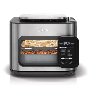 Ninja Foodi countertop oven with dual compartments, digital control panel, and multiple cooking functions like air fry, roast, bake, and dehydrate.