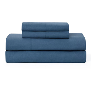 3-piece UGG sheet set in deep blue, including a fitted sheet, flat sheet, and one pillowcase. Made from soft, breathable fabric.
