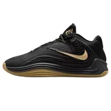 Black athletic shoe with intricate patterns, featuring a gold Nike Swoosh and gum-colored sole.