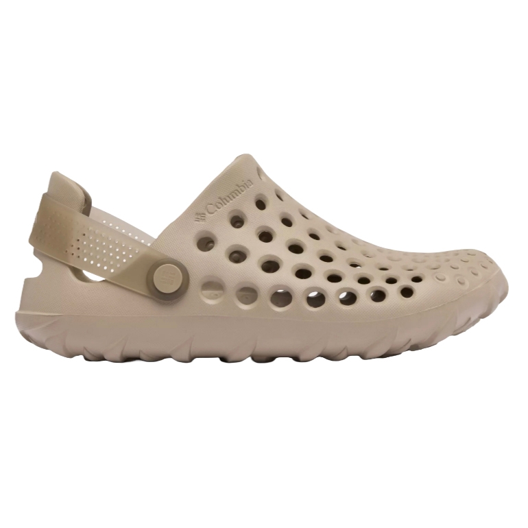 A beige Columbia slip-on shoe with perforated holes for breathability and an adjustable heel strap.