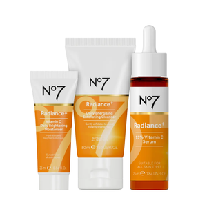 No7 Radiance+ skincare set featuring a Vitamin C Daily Brightening Moisturiser (25ml), Daily Energising Exfoliating Cleanser (50ml), and 15% Vitamin C Serum (25ml), designed for hydrating and brightening all skin types.