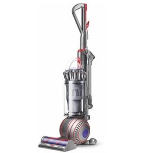 Upright vacuum cleaner with a cylindrical design, featuring a transparent dustbin and a ball mechanism for maneuverability.
