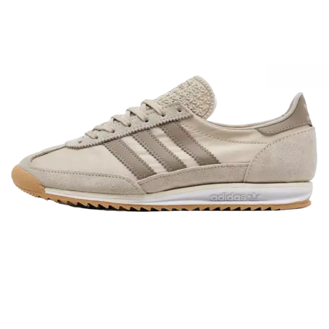 Adidas SL 72 Casual Shoes feature a beige color with a low-profile design, signature three stripes, suede and textile upper, textured tongue, and gum outsole.
