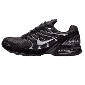 The Nike Air Max Torch 4 shoes have a black mesh and synthetic upper with a metallic silver Swoosh logo, featuring visible Air cushioning in the heel for comfort and a sporty design.