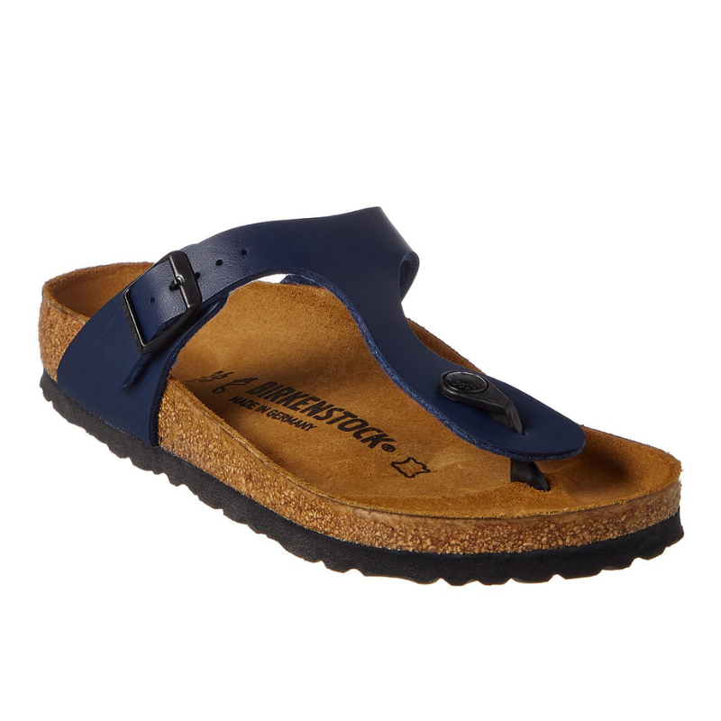 Blue Birkenstock Birko-Flor sandal with a cork footbed, buckle closure, and a thong style strap. The sole is black, and it features a contoured footbed designed for comfort.