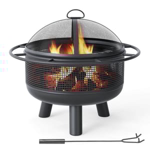 A metal fire pit with a mesh dome lid, featuring burning wood and flames inside. It includes a metal poker for stoking the fire.