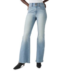Light blue flared jeans with a high waist, faded detailing, and raw hem, paired with black heeled boots.