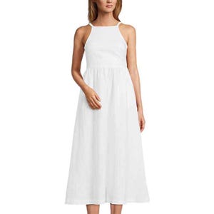 A white sleeveless midi dress featuring a high neckline and a fitted bodice that flows into a soft, gathered skirt, made from lightweight linen for a breezy, summery feel.